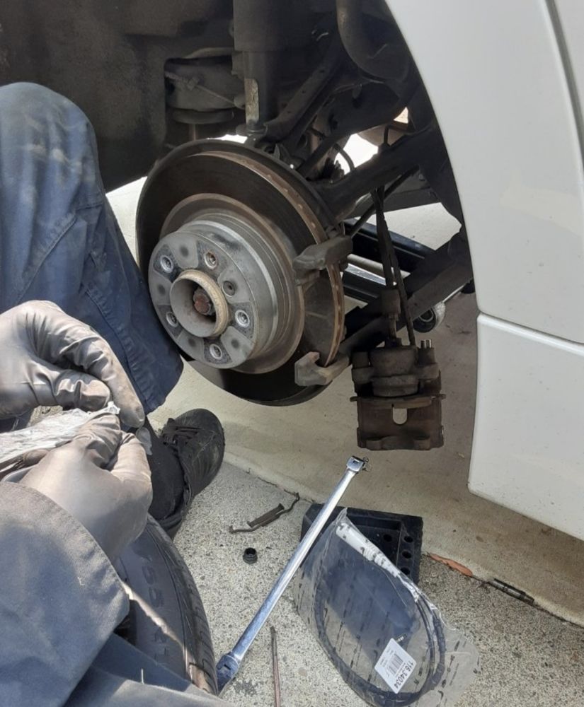 Tempe mobile mechanic mid brake job at a customer home